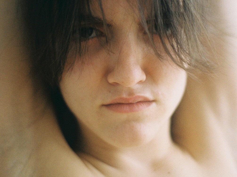 Women face portrait shot by photographer Ray Litsala